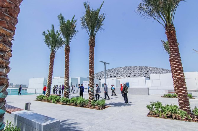Abu Dhabi Marvelous highlights with Louvre,Grand Mosque & 5</em>lunch – Lunch at a 5-star hotel: a real break, not a token meal’ /><br />
Lunch is included, and it’s one reason this tour feels “easy.” You’ll eat a buffet lunch at a local <strong>5-star hotel</strong>, with soft drinks and water included. The program places lunch between the two major sights, so you’re not rushing from one monument to the next on an empty stomach.</p>
<p><p>For value, this matters. In Abu Dhabi, eating well can be pricey if you’re doing it on your own between sites. Here, the lunch is part of the schedule, so you don’t waste time searching for a place or worrying about whether it fits the timing.</p>
</p>
<p><p>Also, the change of pace is useful. The Louvre is heavy on architecture and visuals; the mosque is heavier on rules and stillness. Lunch gives your body a reset so you can handle the mosque portion comfortably.</p>
</p>
<h2 id="how-the-guide-and-pickup-reduce-stress-and-save-time">How the guide and pickup reduce stress (and save time)</h2>
<p><img width="670" height="446" decoding="async" src=