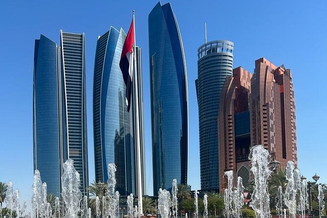 Abu Dhabi Tour Grand Mosque Heritage Village Emirates Palace - The view-drive stops: royal residences, Etihad Towers, and presidential areas