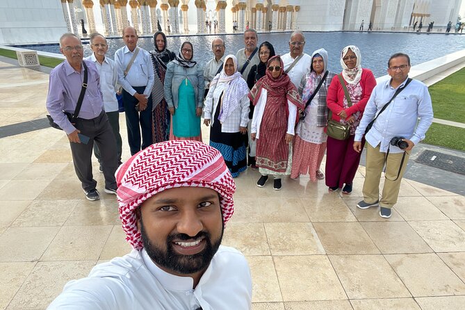 Abu Dhabi Tour Grand Mosque Heritage Village Emirates Palace - Al Mina Fish Market: dates, dry fruit, and tasting your way through souvenirs