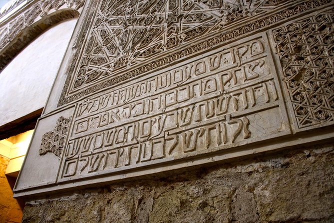 Cordoba Mosque and Jewish Quarter Guided Tour - Navigating La Judería: synagogue, craftsmen souk, and Maimonides