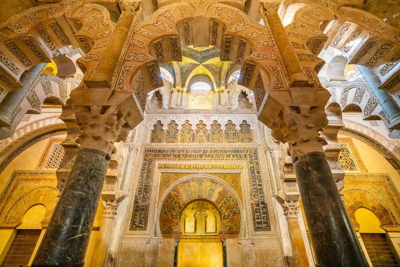 Córdoba: Mosque, Jewish Quarter & Tour with Ticket - Inside the Mosque-Cathedral: Red-and-White Arches, the Mihrab, and the Expansion Story