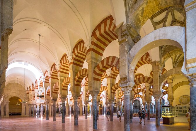 Cordoba Tour with Mosque, Synagogue and Patios from Malaga - Inside the Mezquita-Catedral: Light, Lines, and Scale
