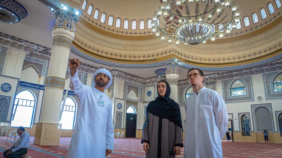 Dubai: City Highlights Tour with Blue Mosque & Street Food - Sheikh Zayed Road, Canal Views, and the Infinity Tower Stop