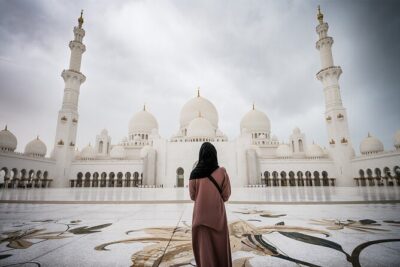 From Dubai: Abu Dhabi Day-Tour Grand Mosque, BAPS Temple & Lunch - The city loop: Corniche beaches, Emirates Palace views, and market time