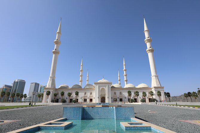 From Dubai to Fujairah: Full Day Tour with Sheikh Zayed Grand Mosque - Khor Fakkan Square, Resistance Monument, amphitheater, and the waterfall