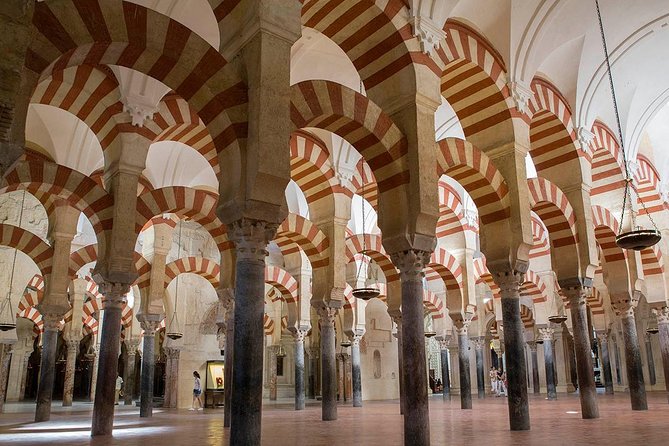 Guided visit to the Mosque and the Jewish Quarter of Cordoba - La Judería walk: narrow streets, flower pots, and real neighborhood feel