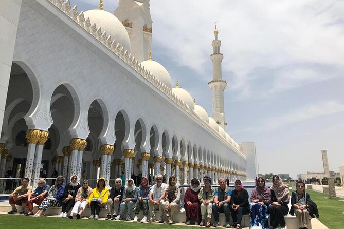 Half day City Tour of Abu Dhabi with Sheikh Zayed Grand mosque - Islamic Art Gallery and the Yas Island photo-and-shopping detour