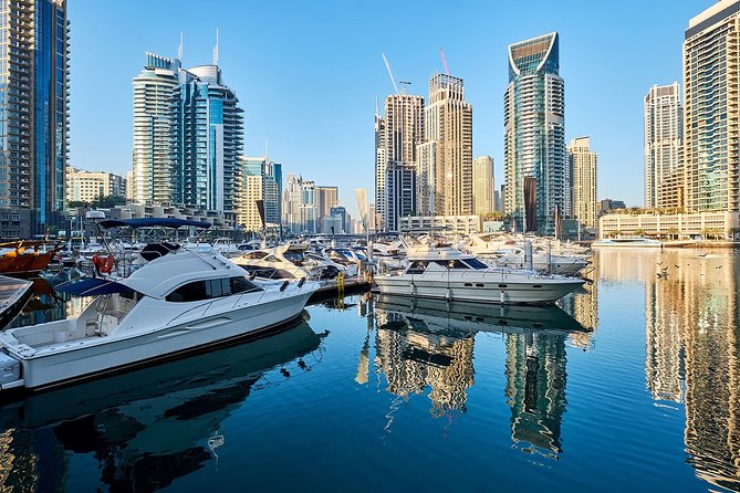 Half-Day Dubai City Tour with Blue Mosque, Creek, Souks & Abra - Gold and Spice Souks: Shopping Energy with Real-World Limits